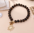 Maria / Collier perles soleil