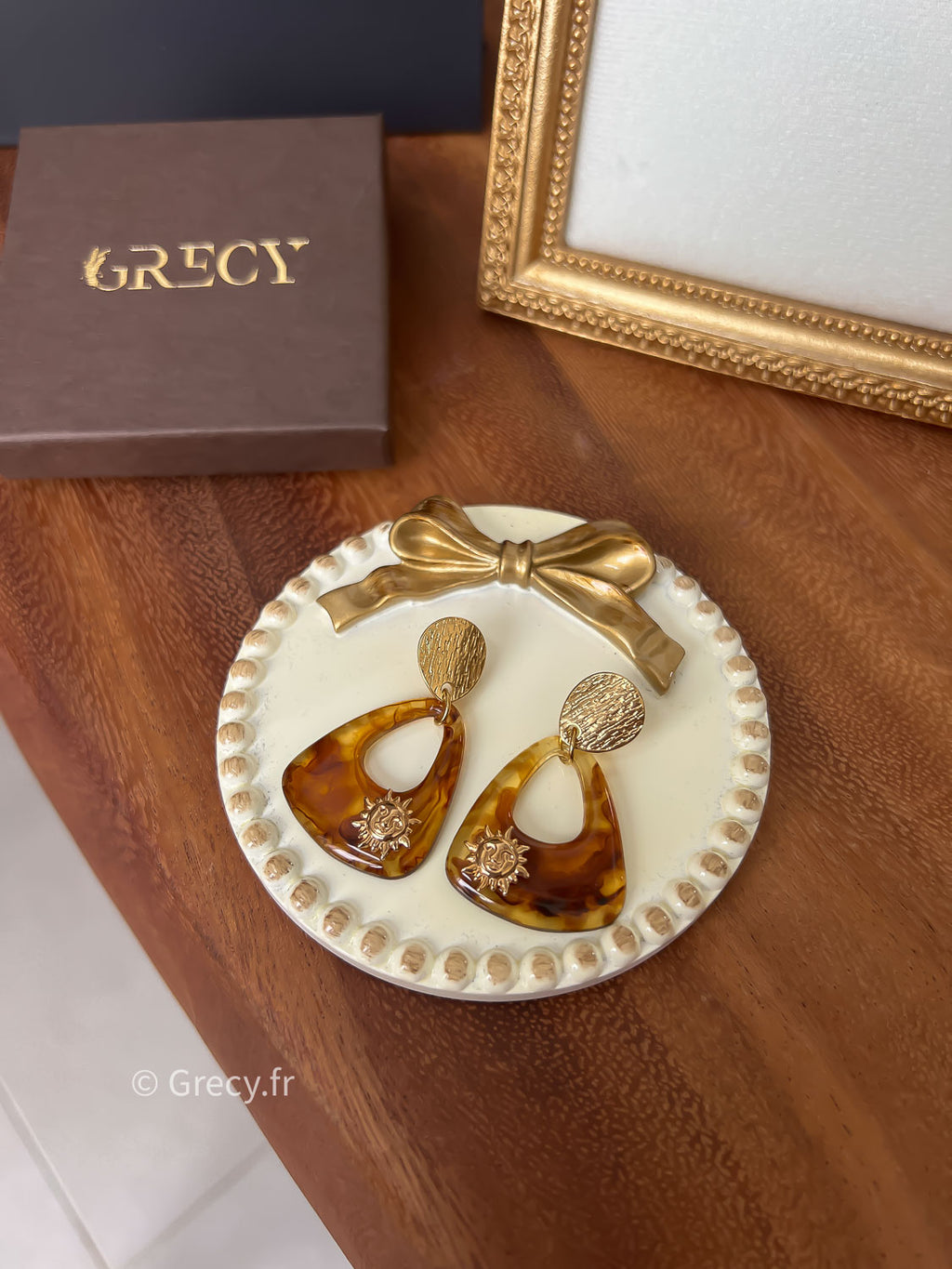 Laurine / Boucles d'oreilles triangle logo soleil