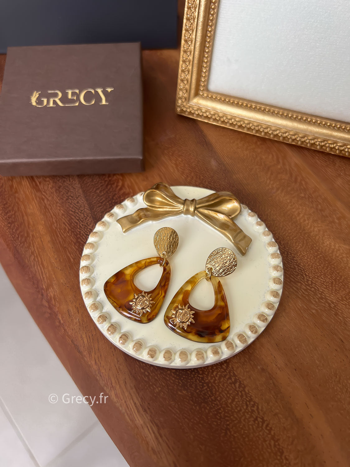 Laurine / Boucles d'oreilles triangle logo soleil