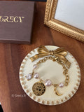 Emilie / Bracelet perles nacre charms lune, strass et soleil