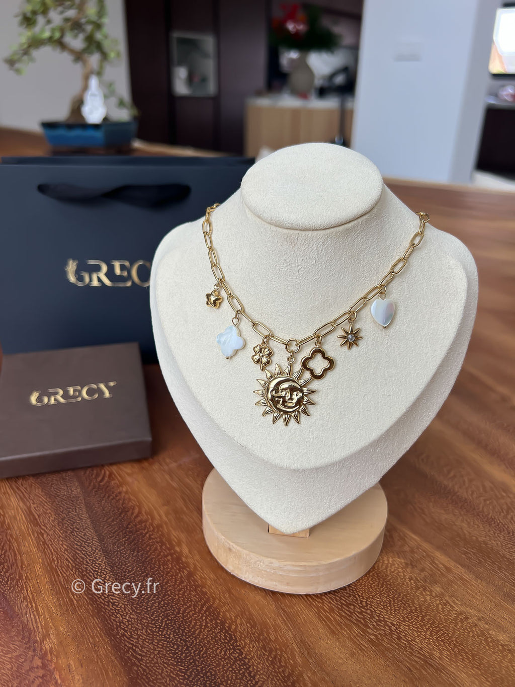 Léonne / Collier charms soleil