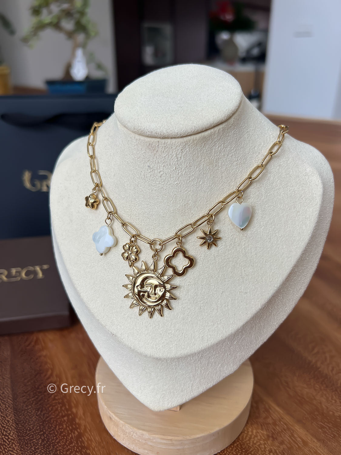 Léonne / Collier charms soleil