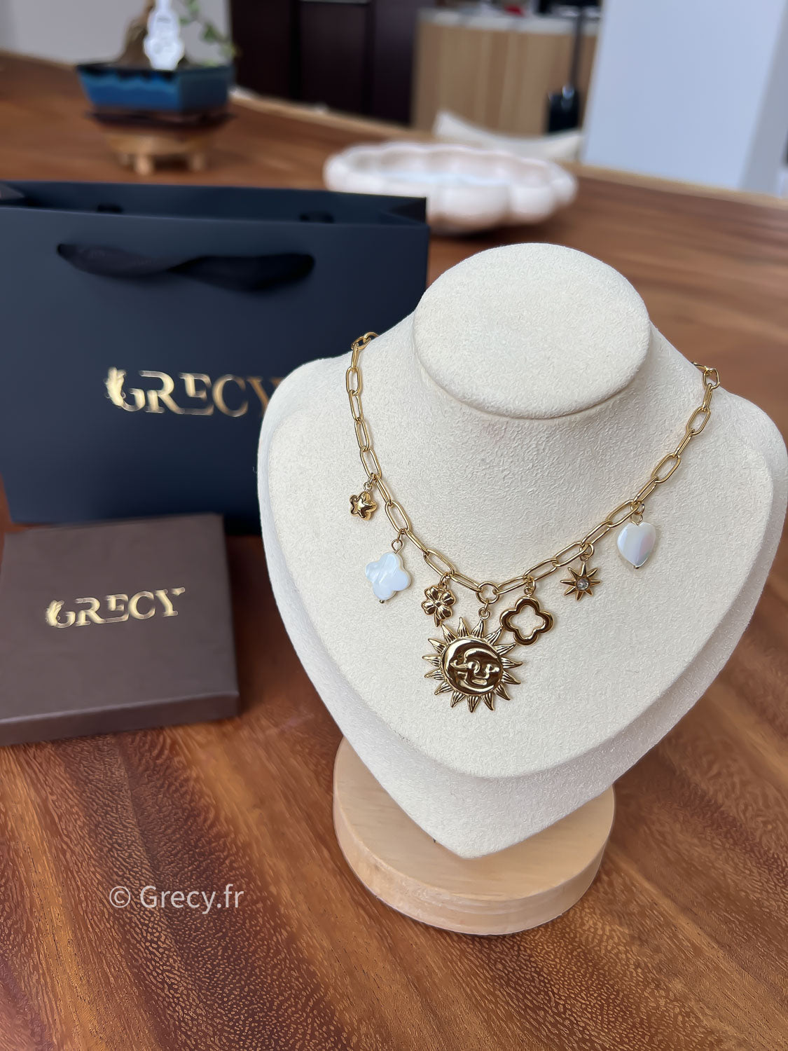 Léonne / Collier charms soleil